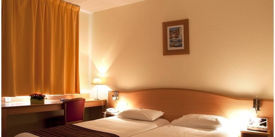 Hôtel Kyriad Montpellier Sète Balaruc — chambre